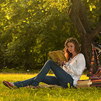 Girl Studying Under Tree